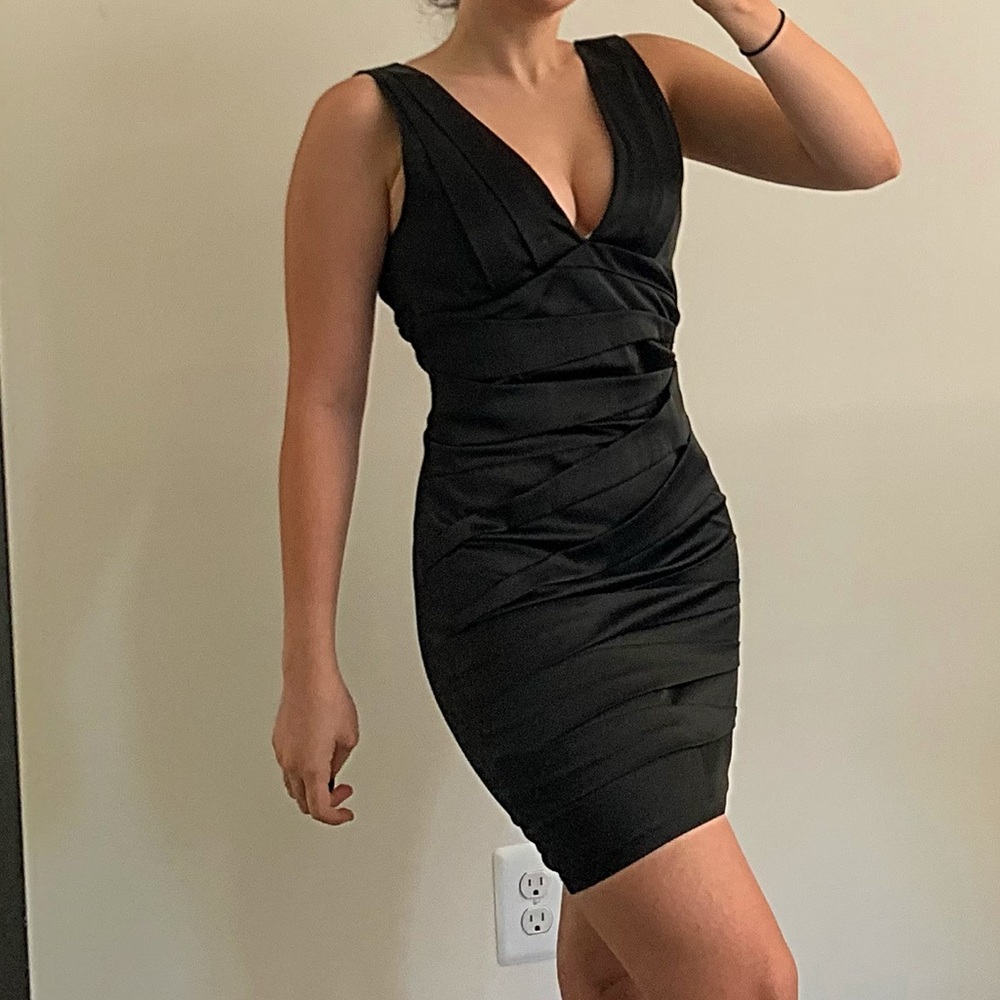 black sleeveless satin dress